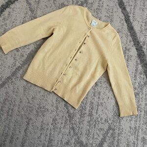 Bloomingdales’ AQUA cashmere yello Cardigan with crystal buttons